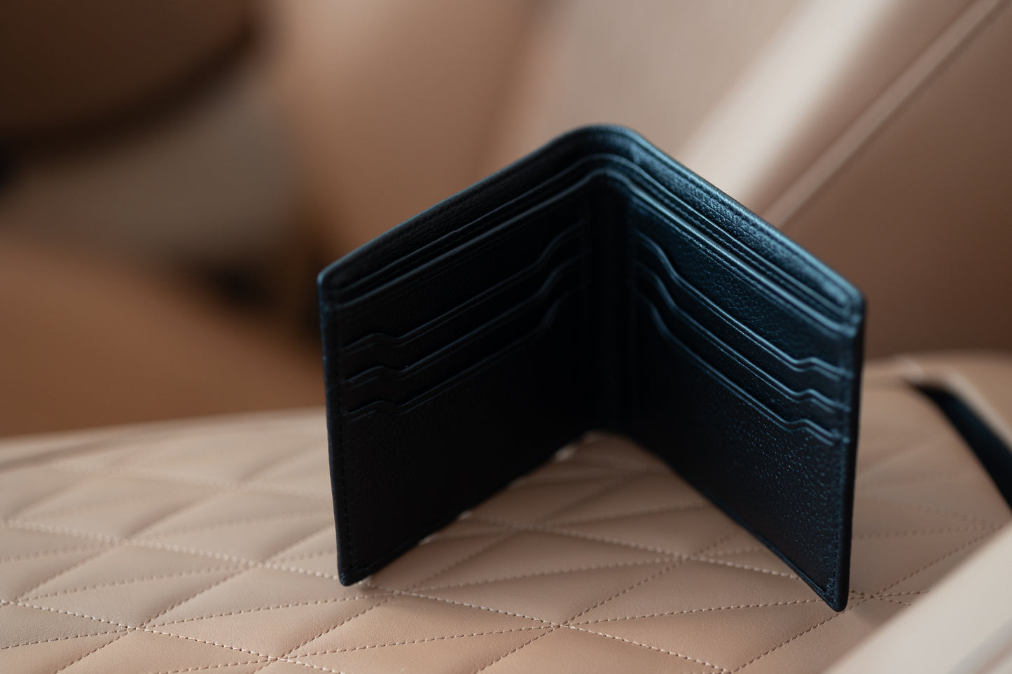 Aston Martin Bi-Fold Wallet in Classic Black color.